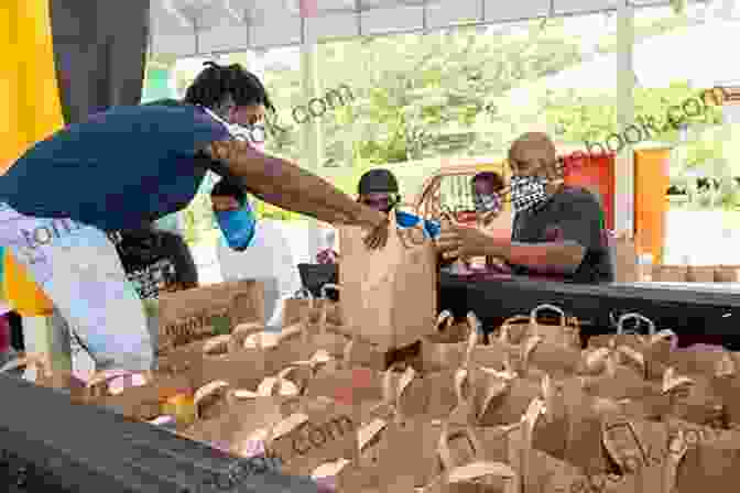 Image Of Volunteers Distributing Food During A Mutual Aid Food Drive Pandemic Solidarity: Mutual Aid During The Covid 19 Crisis (FireWorks)