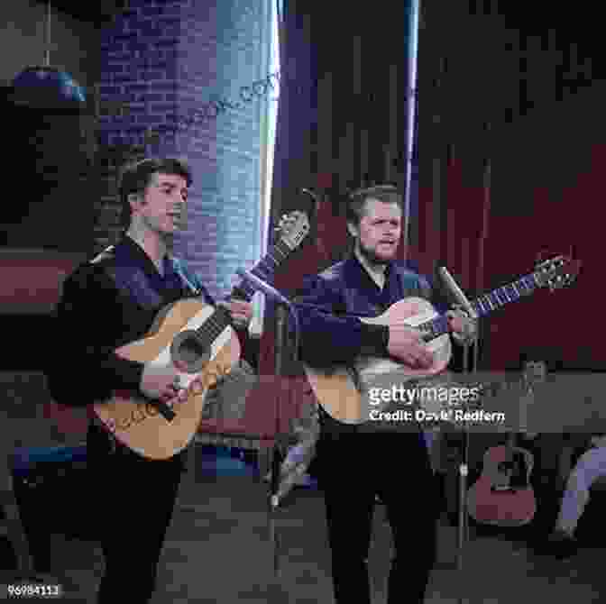 The Corries Performing On Stage, With Ronnie Browne (center) Singing And Playing Guitar. That Guy Fae The Corries